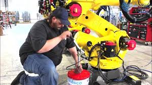 Precision or Pressure?  The Engineer’s Guide to Selecting Grease Guns for Industrial Robotics