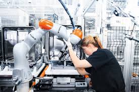 Humans and Cobots working together in harmony and safely on a production line.