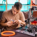 Using a 3D printer to produce spare parts to keep production running.