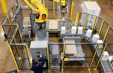 Robot in the Palletizing area placing boxes on to the waiting pallets.